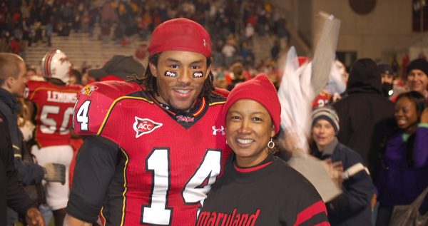 Football mom Jennifer and son Nolan at a University of Maryland football game